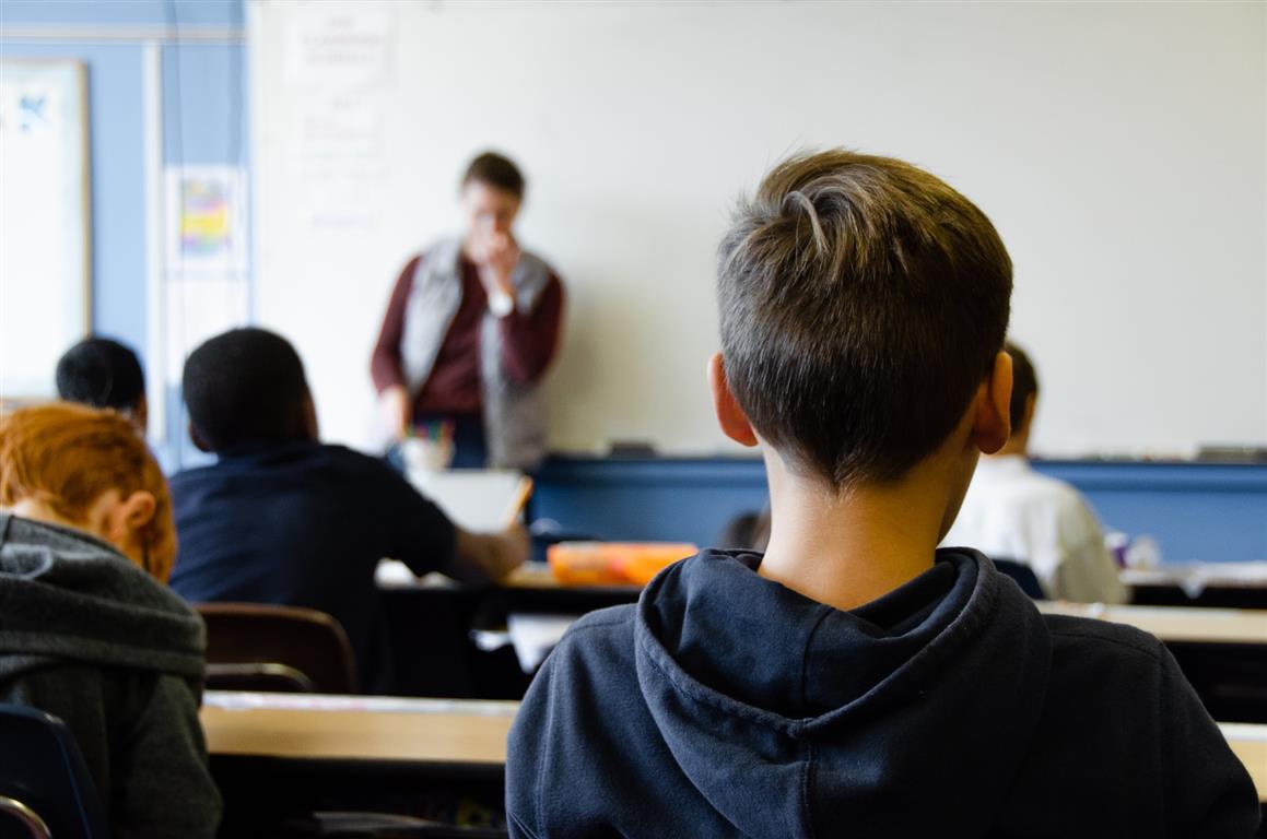 Fifth graders in their classroom at school - Credit: Photo by Taylor Flowe on Unsplash